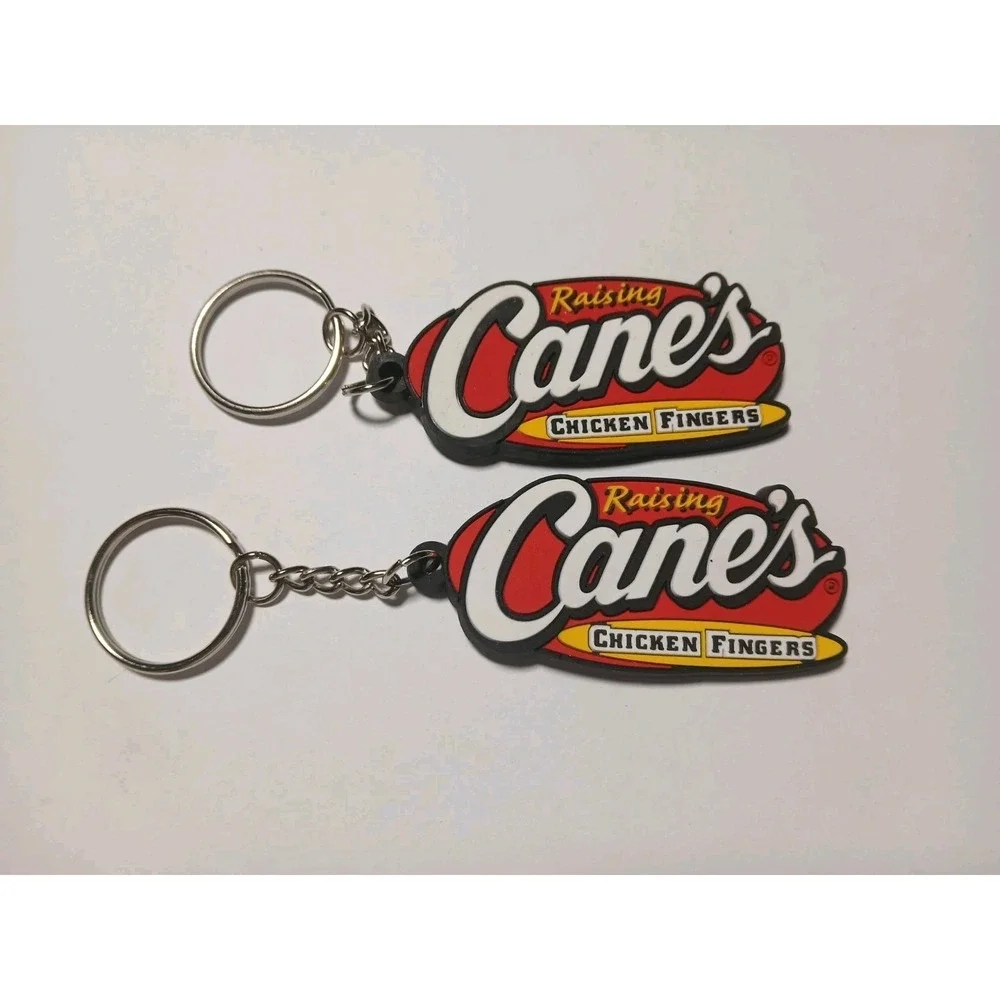 Two Raising Canes Chicken Fingers Rubber Keychain 2.5 Inches X 1 Inch